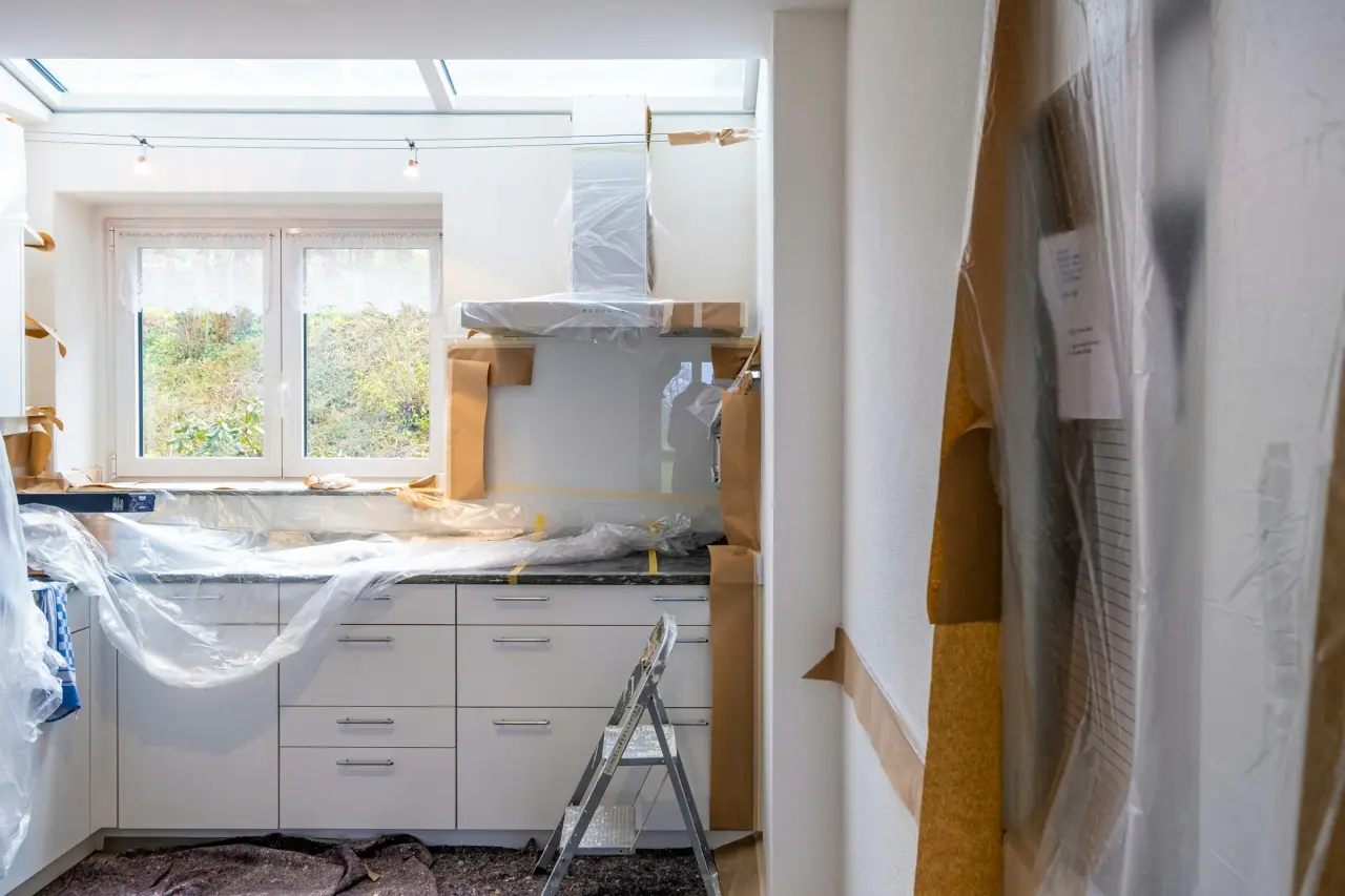 Kadıköy Flat Renovation site: Kitchen cabinets and worktop installation started.
